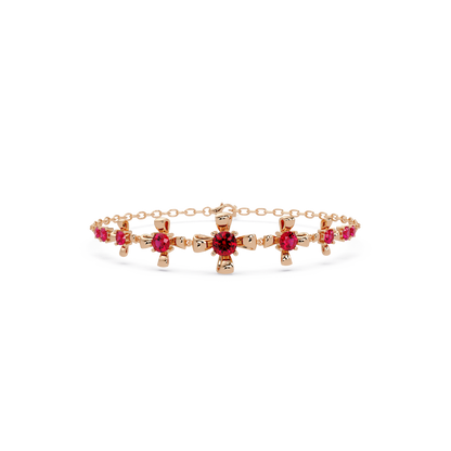 Nine-stone round colorstone chain bracelet, ruby red gemstones in rose gold