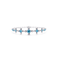 Nine-stone round colorstone chain bracelet, aquamarine blue gemstones in white gold