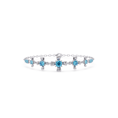 Nine-stone round colorstone chain bracelet, aquamarine blue gemstones in white gold