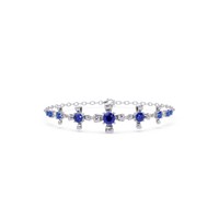 Nine-stone round colorstone chain bracelet, sapphire blue gemstones in white gold