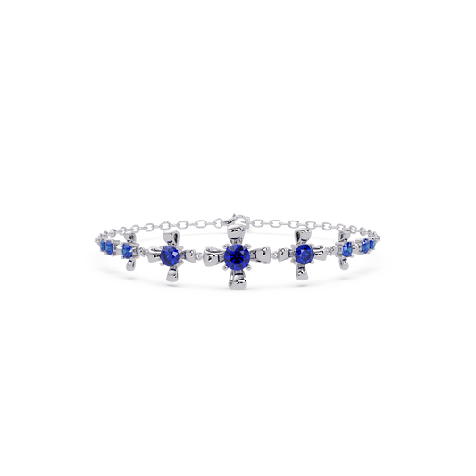 Nine-stone round colorstone chain bracelet, sapphire blue gemstones in white gold