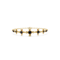 Nine-stone round colorstone chain bracelet, onyx gemstones in yellow gold