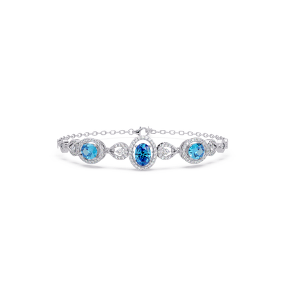 Lunéa Paris three-oval halo pavé bracelet in white gold, aquamarine colorstones