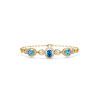 Lunéa Paris three-oval halo pavé bracelet in yellow gold, aquamarine colorstones