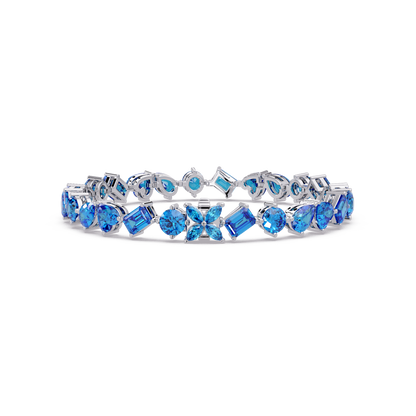 Five-shape aquamarine blue colorstone tennis bracelet in white gold