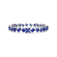 Five-shape sapphire blue colorstone tennis bracelet in white gold
