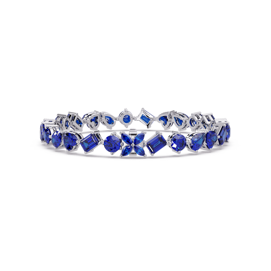Five-shape sapphire blue colorstone tennis bracelet in white gold