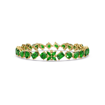 Five-shape emerald green colorstone tennis bracelet in yellow gold