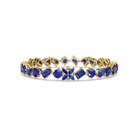 Five-shape sapphire blue colorstone tennis bracelet in yellow gold
