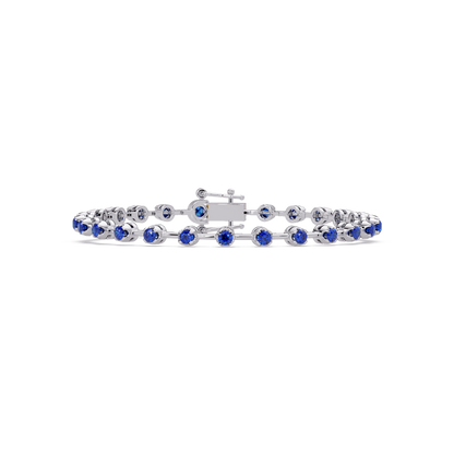 Round sapphire blue colorstone tennis bracelet in white gold