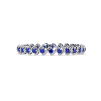 Round sapphire blue colorstone swirl-link tennis bracelet in white gold