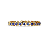 Round sapphire blue colorstone swirl-link tennis bracelet in yellow gold
