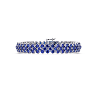Diamond-lattice round sapphire blue colorstone tennis bracelet in white gold