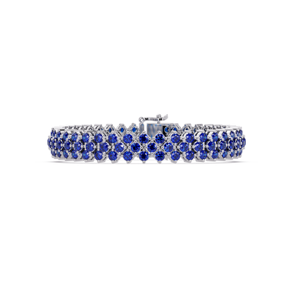 Diamond-lattice round sapphire blue colorstone tennis bracelet in white gold