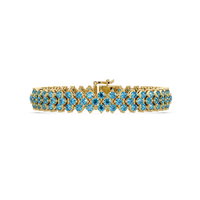 Diamond-lattice round aquamarine blue colorstone tennis bracelet in yellow gold
