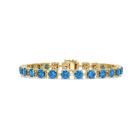 Classic round aquamarine blue colorstone tennis bracelet in yellow gold