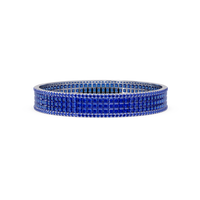 Princess-cut sapphire blue colorstone multi-row bangle in white gold