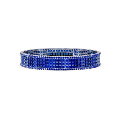 Princess-cut sapphire blue colorstone multi-row bangle in white gold