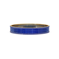 Princess-cut sapphire blue colorstone multi-row bangle in yellow gold