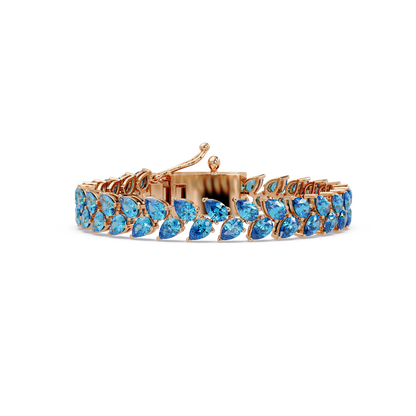 Pear-cut aquamarine colorstone tennis bracelet in rose gold
