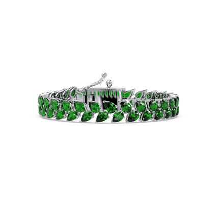 Pear-cut green colorstone tennis bracelet in white gold