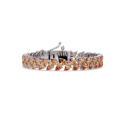 Pear-cut topaz colorstone tennis bracelet in white gold