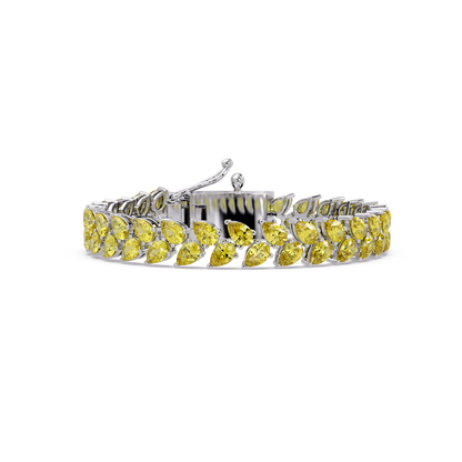 Pear-cut yellow colorstone tennis bracelet in white gold