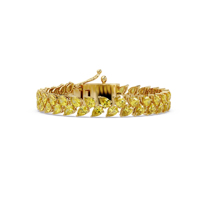 Pear-cut yellow colorstone tennis bracelet in yellow gold