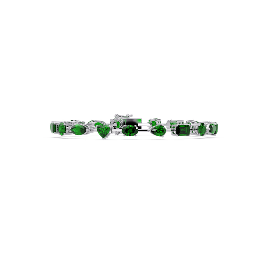 Mixed-shape green colorstone tennis bracelet in white gold