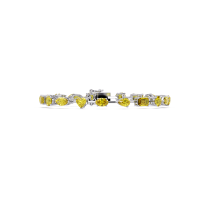 Mixed-shape yellow colorstone tennis bracelet in white gold