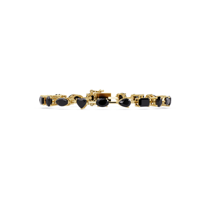 Mixed-shape onyx colorstone tennis bracelet in yellow gold