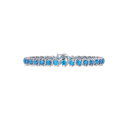 Round aquamarine colorstone tennis bracelet in white gold