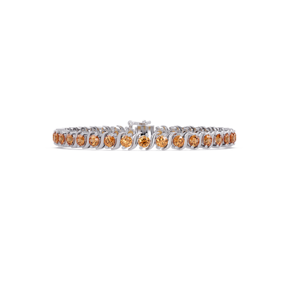 Round topaz colorstone tennis bracelet in white gold