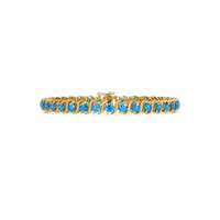 Round aquamarine colorstone tennis bracelet in yellow gold