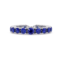 Round sapphire blue colorstone bangle in white gold