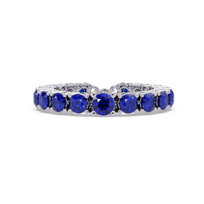 Round sapphire blue colorstone bangle in white gold