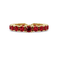 Round ruby red colorstone bangle in yellow gold