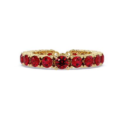 Round ruby red colorstone bangle in yellow gold