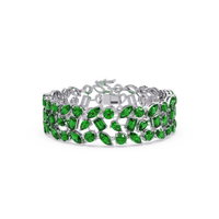Mixed-shape emerald green colorstone tennis bracelet in white gold