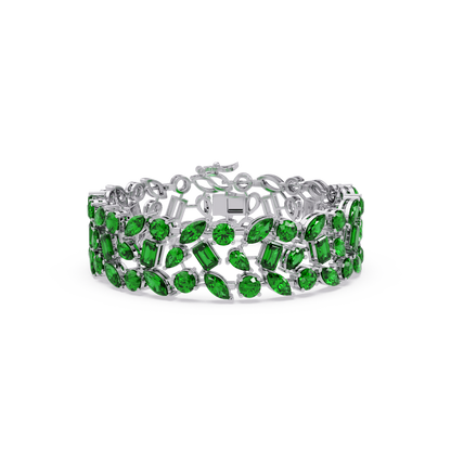 Mixed-shape emerald green colorstone tennis bracelet in white gold