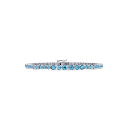 Graduated round aquamarine blue colorstone tennis bracelet in white gold