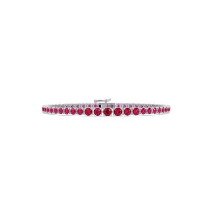 Graduated round ruby red colorstone tennis bracelet in white gold