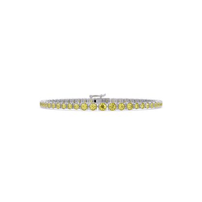 Graduated round citrine yellow colorstone tennis bracelet in white gold