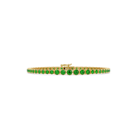 Graduated round emerald green colorstone tennis bracelet in yellow gold