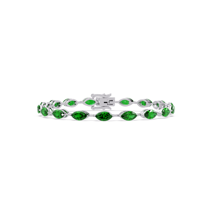 Marquise emerald green colorstone tennis bracelet in white gold