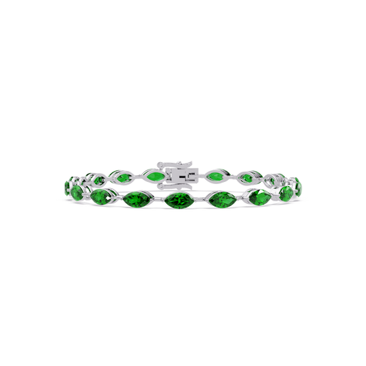 Marquise emerald green colorstone tennis bracelet in white gold
