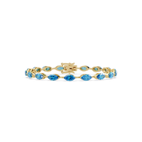 Marquise aquamarine blue colorstone tennis bracelet in yellow gold