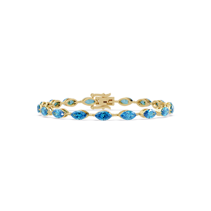 Marquise aquamarine blue colorstone tennis bracelet in yellow gold