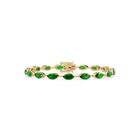 Marquise emerald green colorstone tennis bracelet in yellow gold