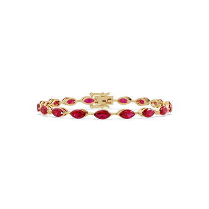 Marquise ruby red colorstone tennis bracelet in yellow gold